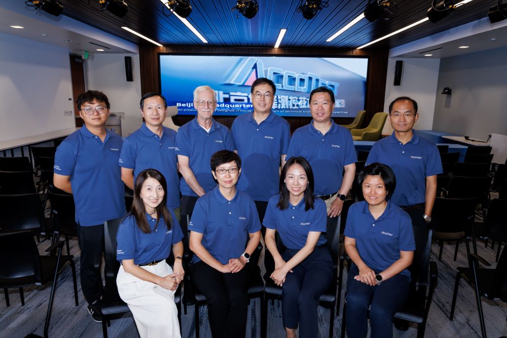 AccoTEST USA team members flanked by global team leaders and members.